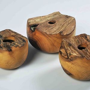 famlily of hollowed natural edge bowls. Acacia 15 to 20 cm