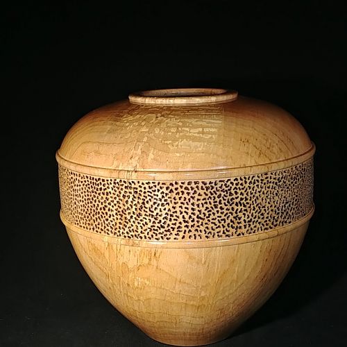 Pierced maple hollow form