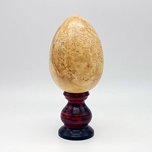 The egg on a stand.
