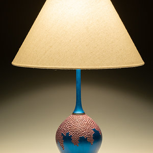 Lamp with carved and painted base