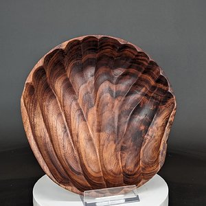Power carved figured walnut bowl