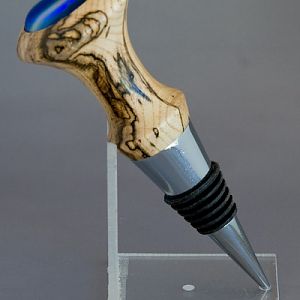 Spalted Hackleberry stopper with dichroic glass cab
