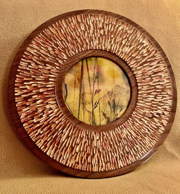 Carved and painted walnut picture frame