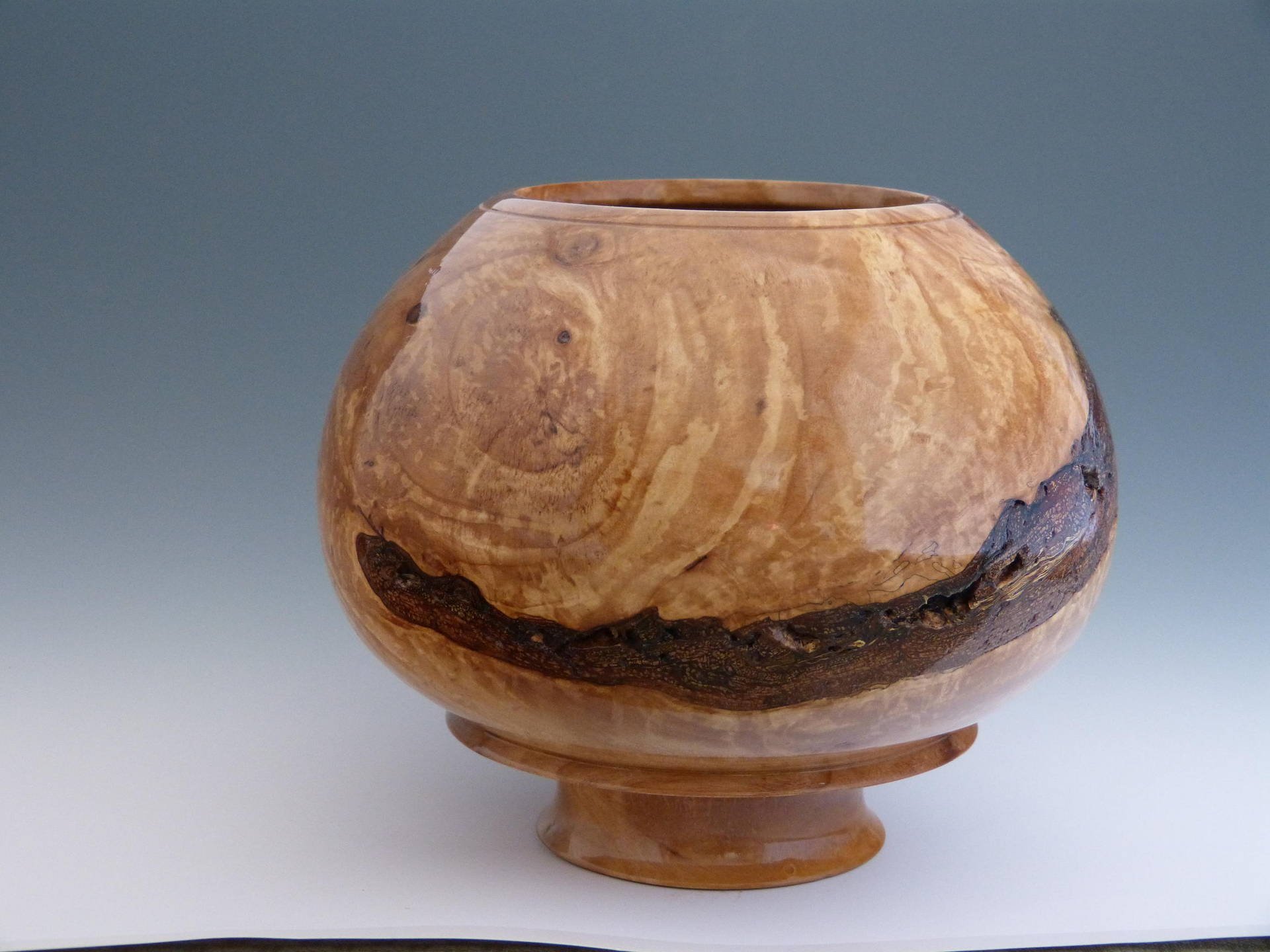 Closed top, footed bowl/hollow form