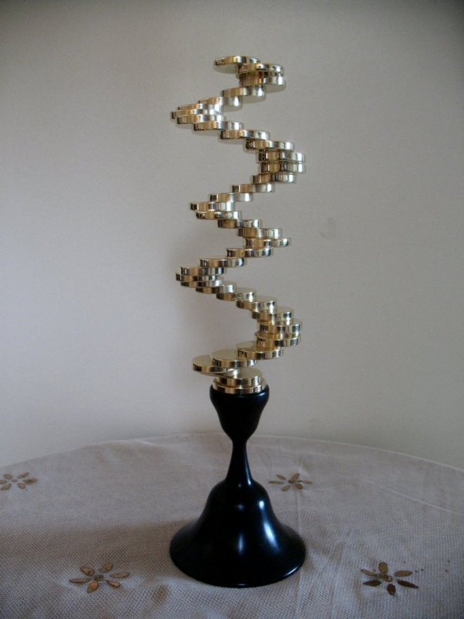 Solid brass spiral staircase with blackwood base