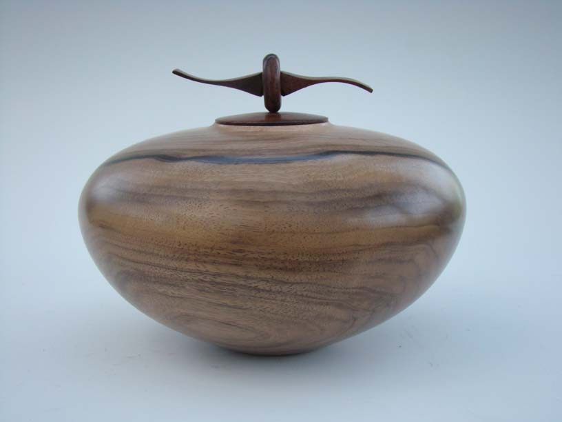 Wallnut hollow form with lid.