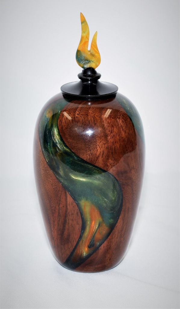 Walnut hollow form with translucent cast resin swirl