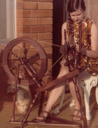 Bron with spinning wheel - cropped.JPG