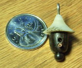 Mini Birdhouse with bone roof and Africanblackwood. body, copper peg.jpg