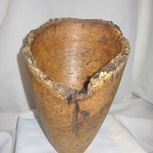 Natural Edge Russian Olive Burl Vessel