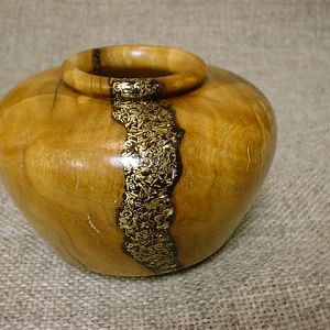 with brass