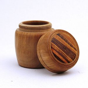 Bradford Pear box with tigerwood insert.in a threaded lid.