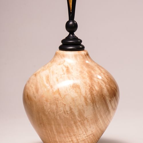 Figured maple vessel.