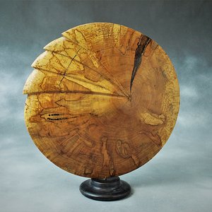 Carved discus