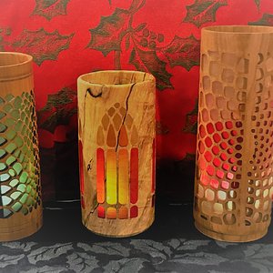 Three vases with translucent epoxy inlays.