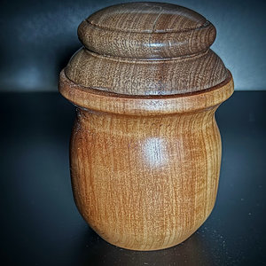Apple wood box with a Walnut cap.
