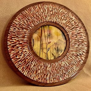 Carved and painted walnut picture frame