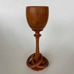 Goblet with captive rings