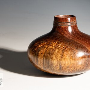Black Walnut vase with embellishment