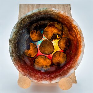 My Pride Month bowl made from root wood and Red, Blue, and Yellow resin