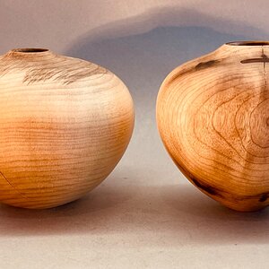 Two small hollow forms
