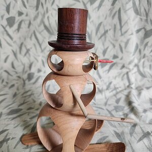 Frosty running from the dog that makes yellow snow