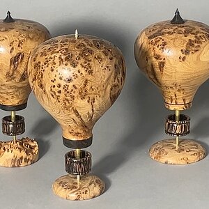 Three hot air balloons