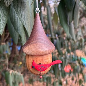 A little turned and carved ornament for my son and daughter-in-law