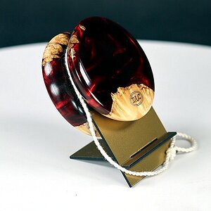 Cast acrylic and boxelder burl yo-yo.
