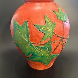Sweetgum hollow form with sweetgum leaves