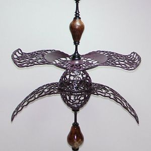 Pierced purpleheart double winged tower.