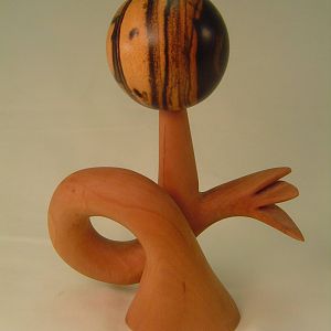 Apple and ebony sculpture.