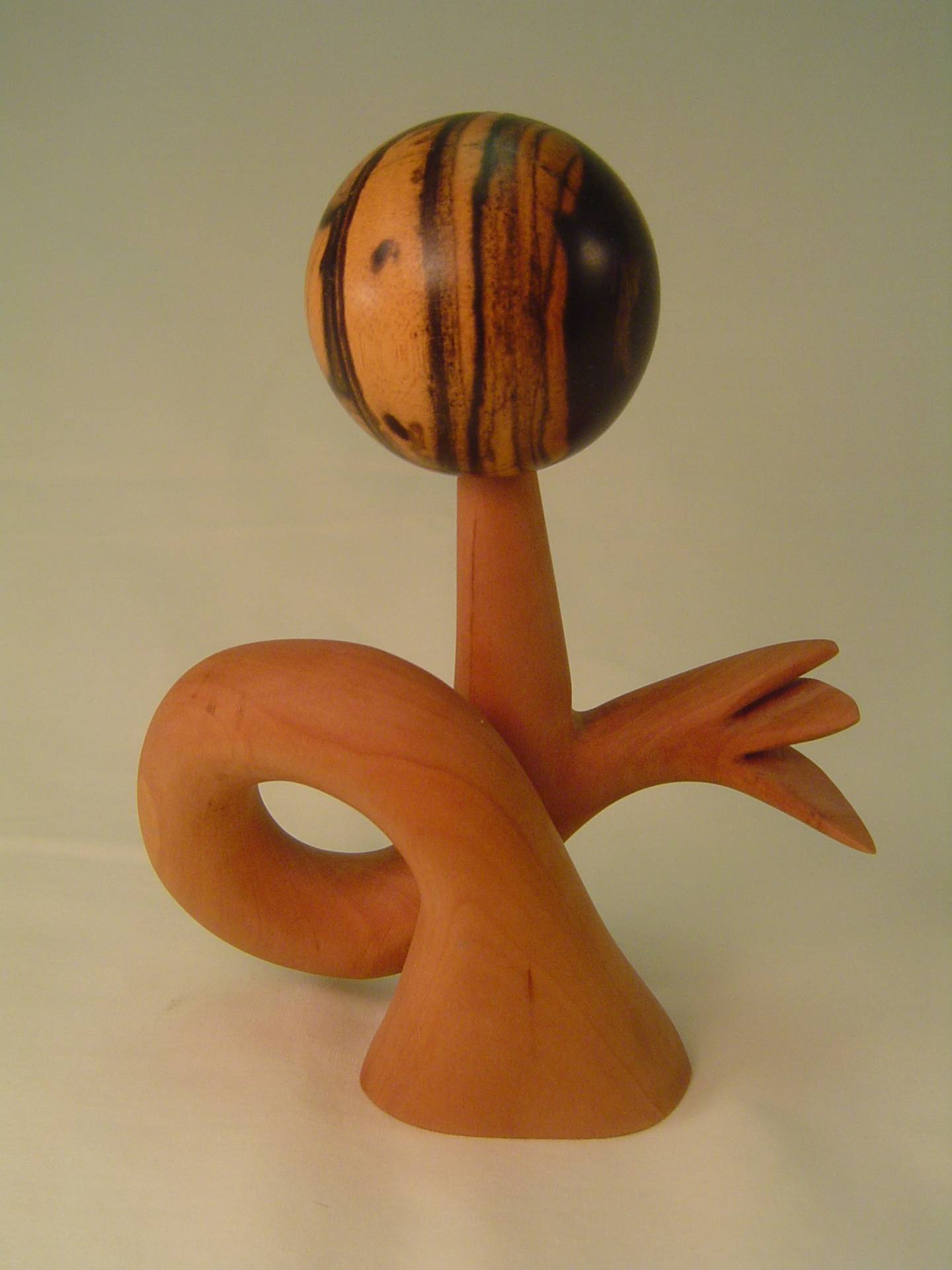 Apple and ebony sculpture.