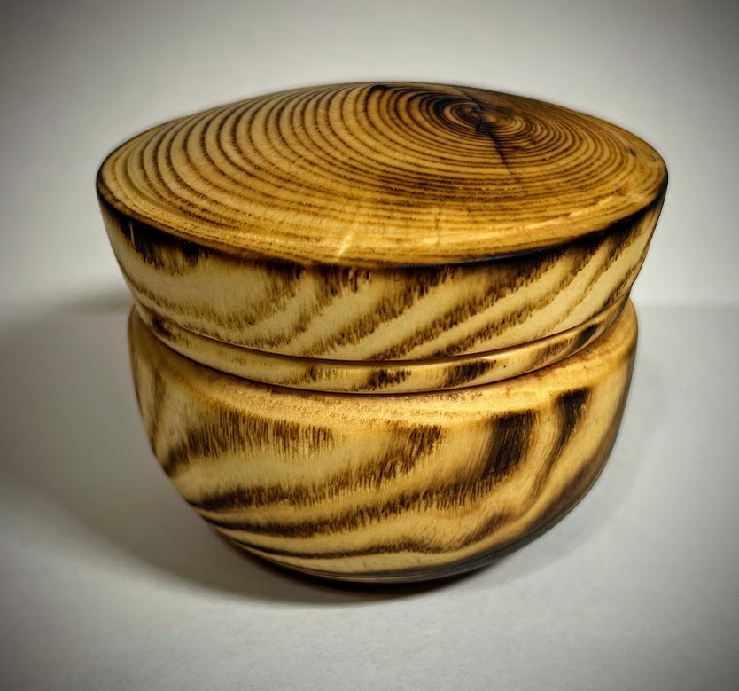 Ash box with burn accents and tried and true oil.