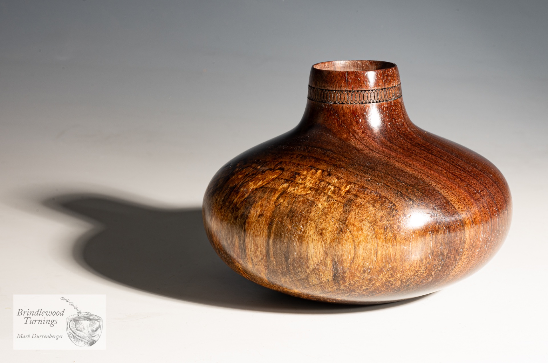 Black Walnut vase with embellishment