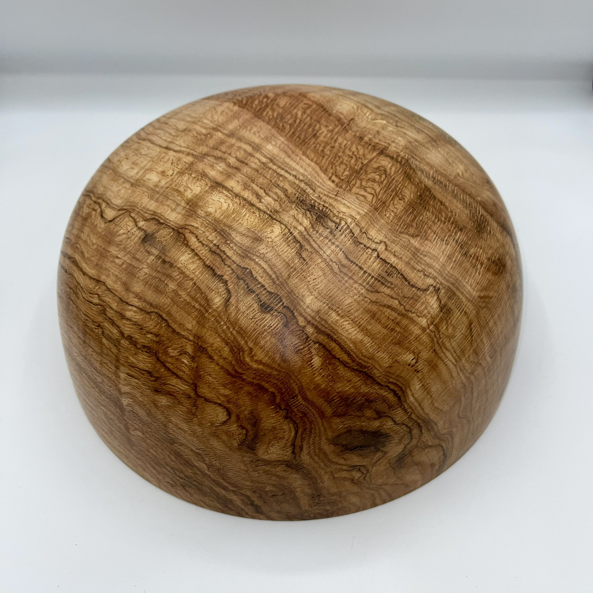 Bottom of black oak burl bowl