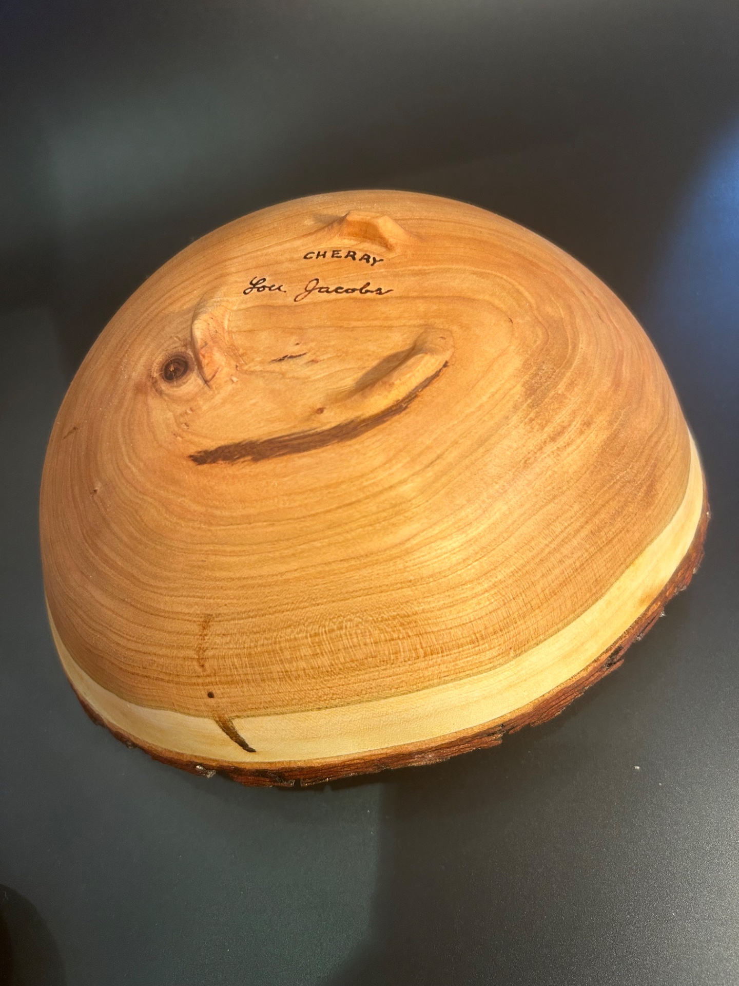 Bottom view of my cherry natural edge bowl.  9” x 11” x 5” tall