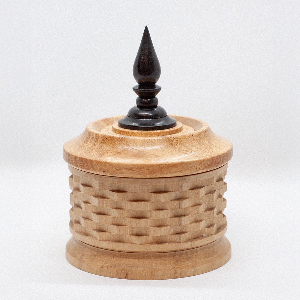 Box with rose engine elements