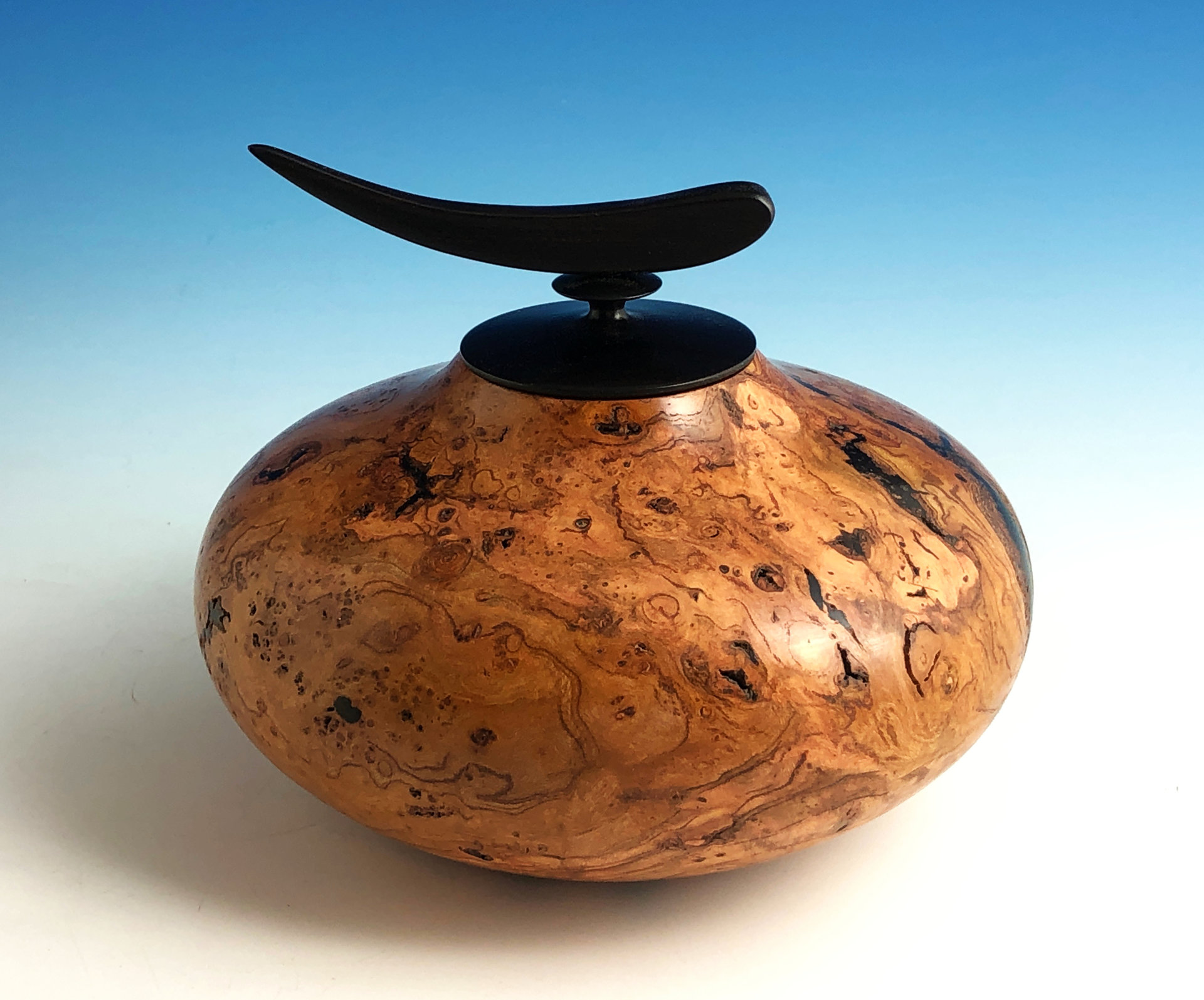 Cherry burl hollow form.