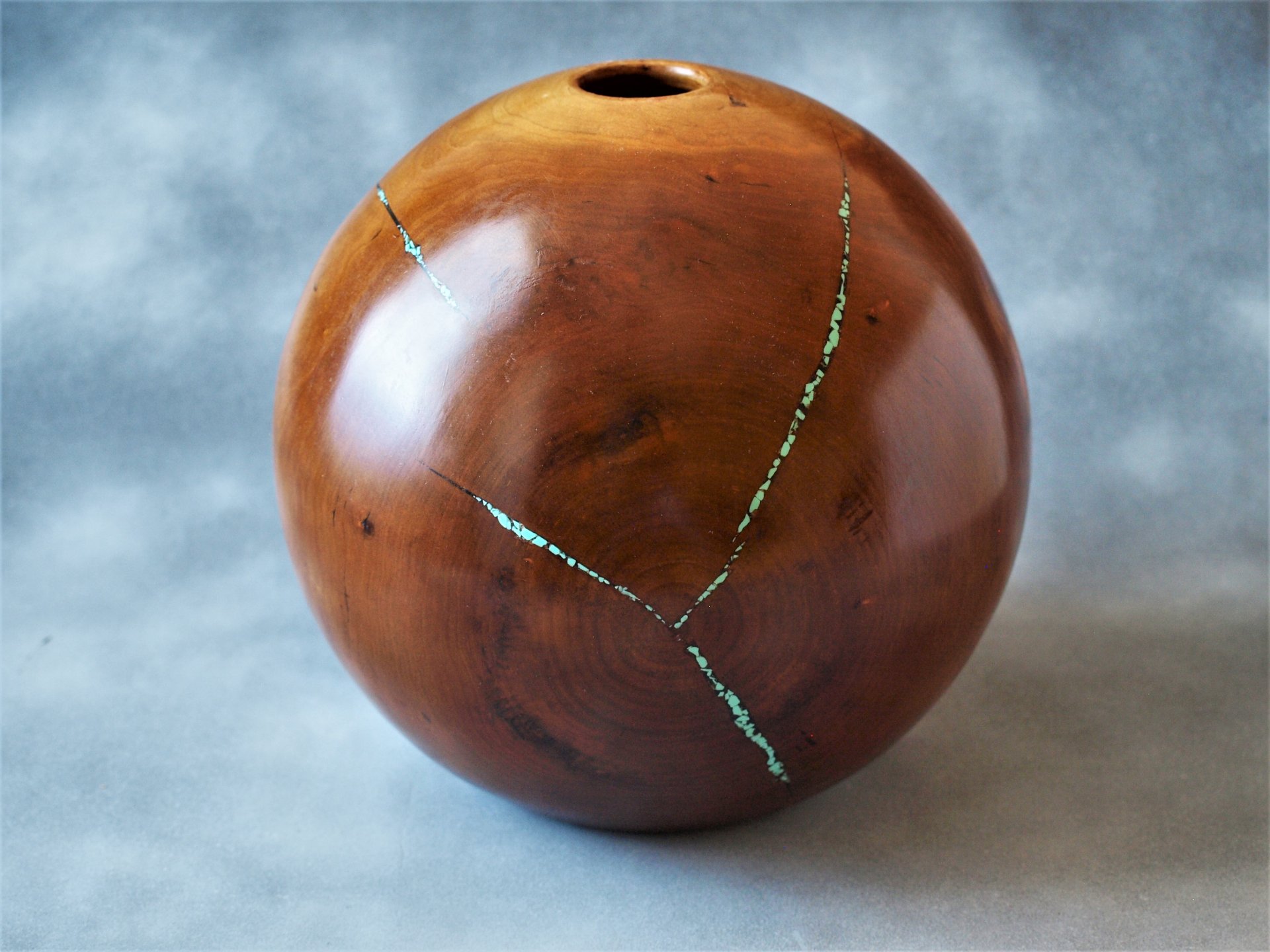 Cherry globe with turquoise