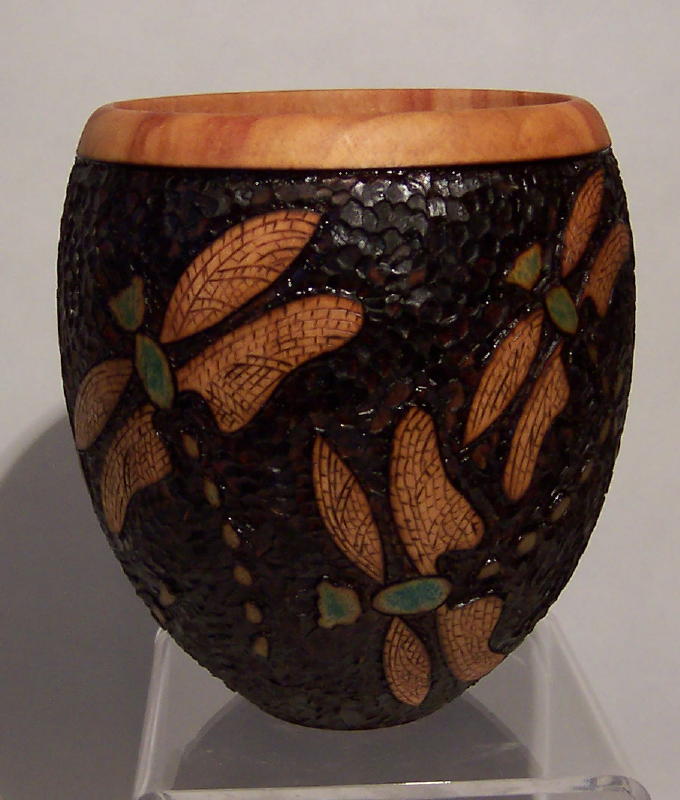 Dragonflies, burned relief