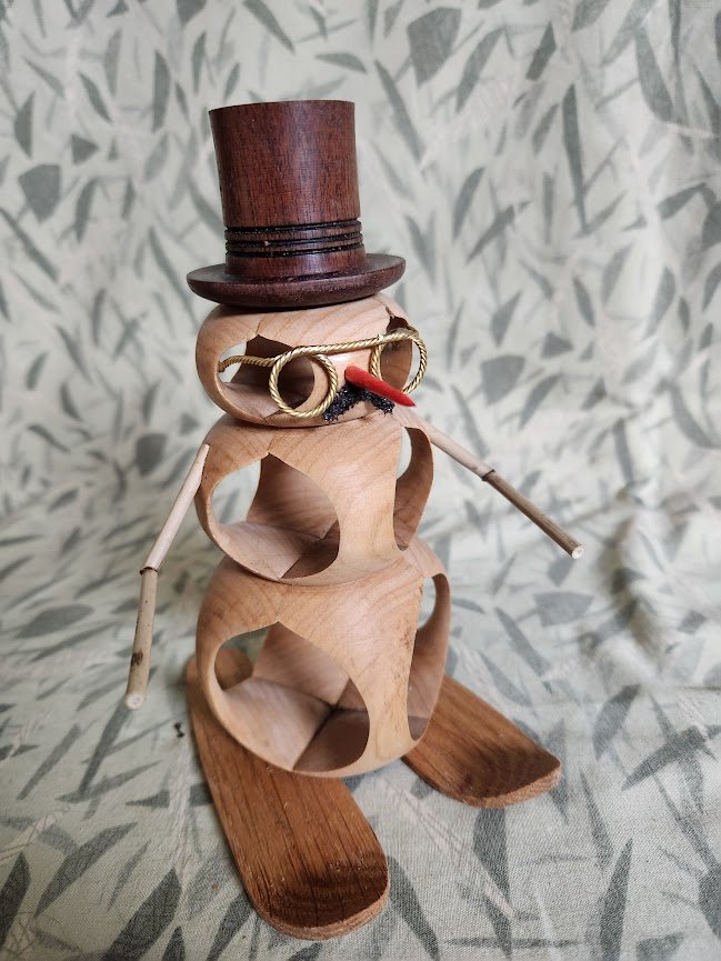 Frosty running from the dog that makes yellow snow