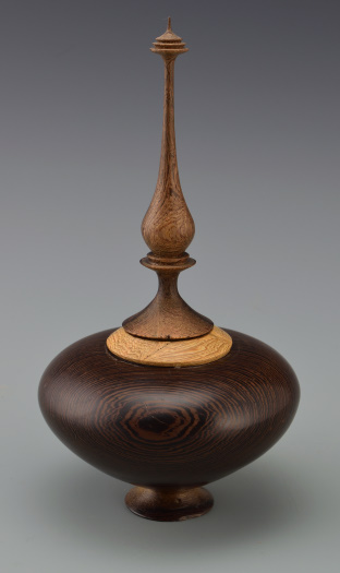 Hollow form with finial