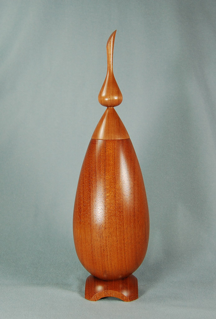Honduran Mahogany hollow vessel with Cherry finial