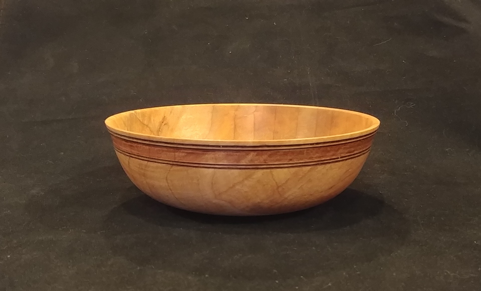 Maple bowl with Padauk burnished highlight