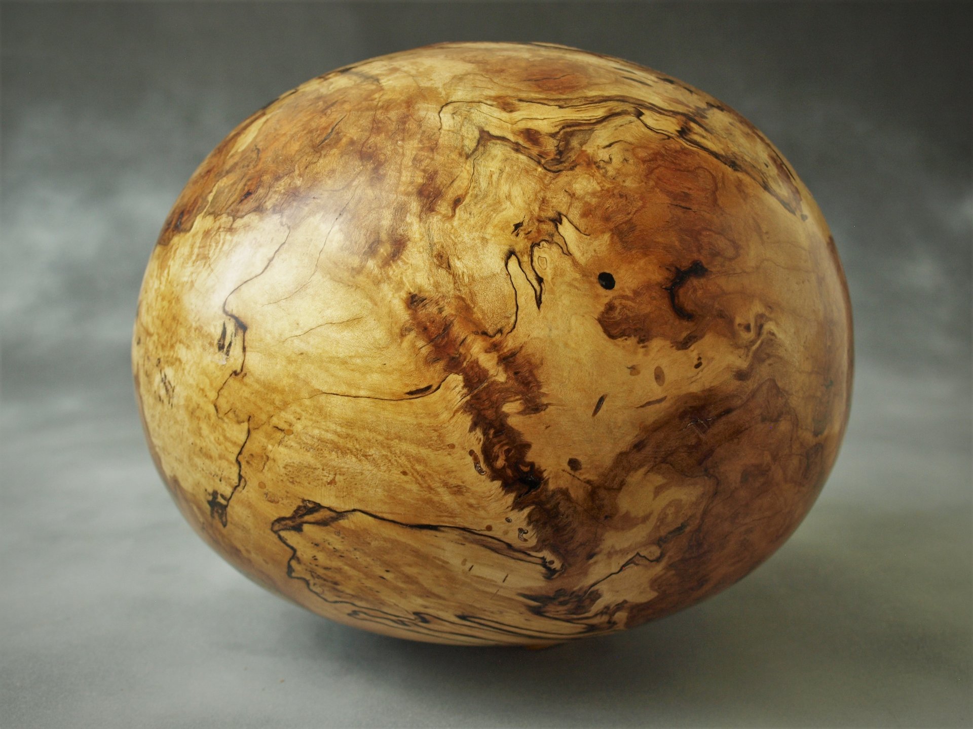 Maple burl hollow globe