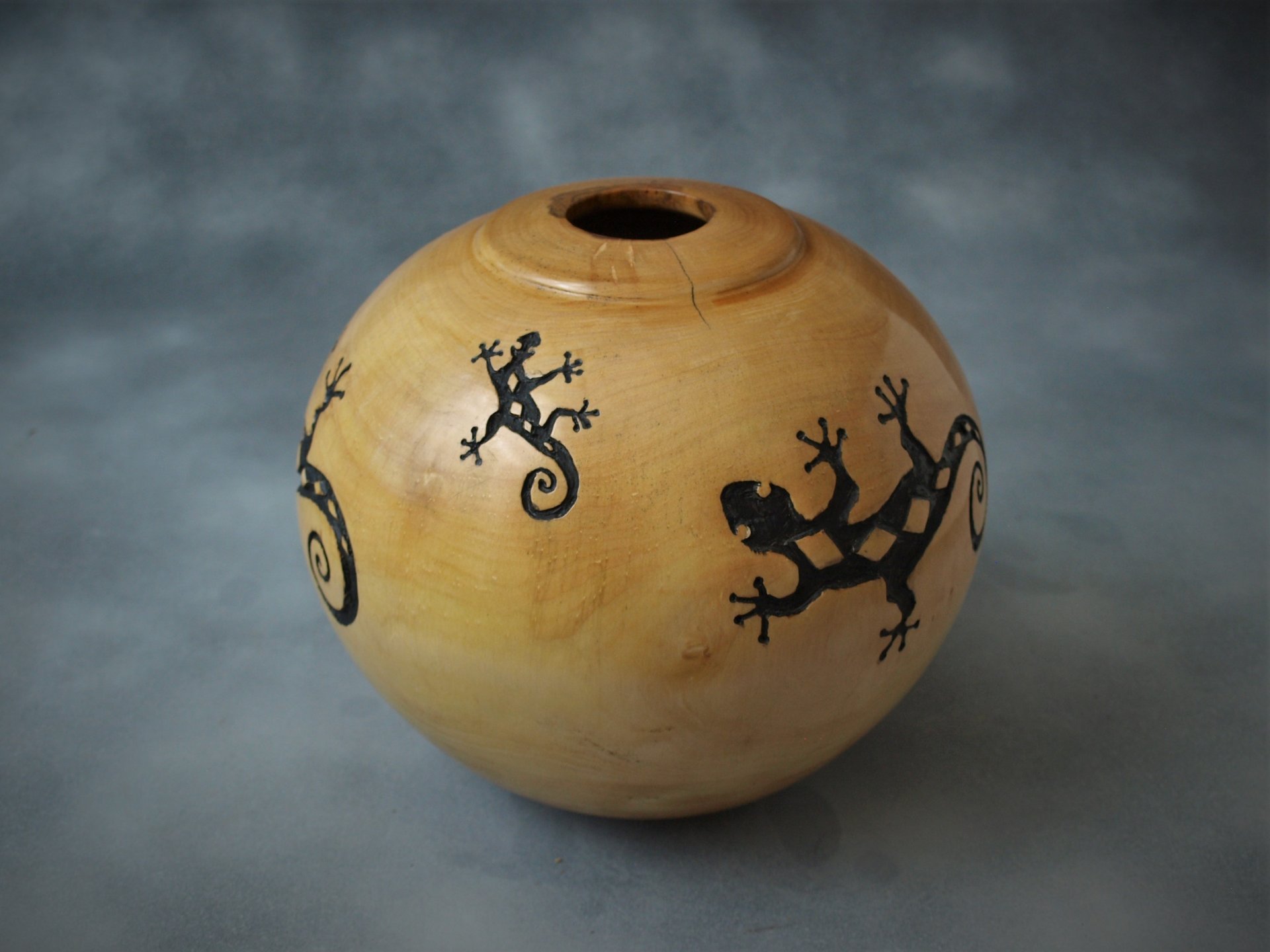 Maple hollow form with surface carving