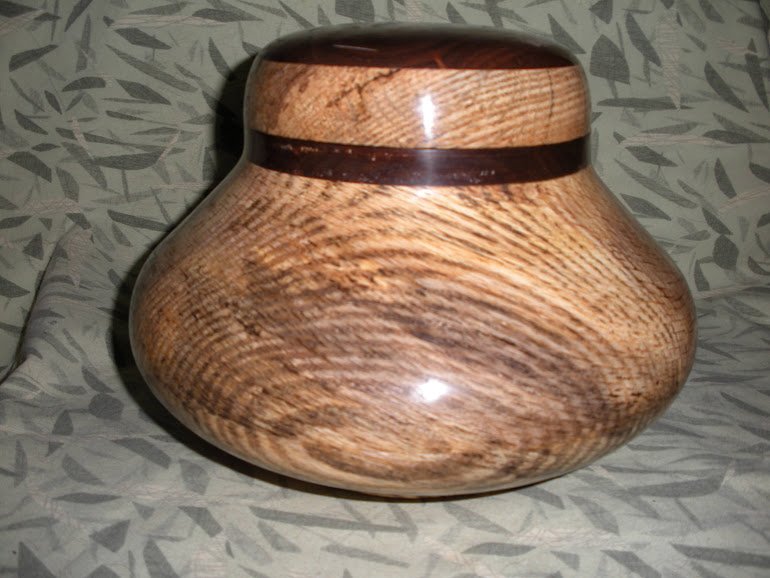 Oak and Walnut box  An Experiment using a large plastic  peanut jar as a screw connection.  8 1/2 inches diameter, 7 inches tall