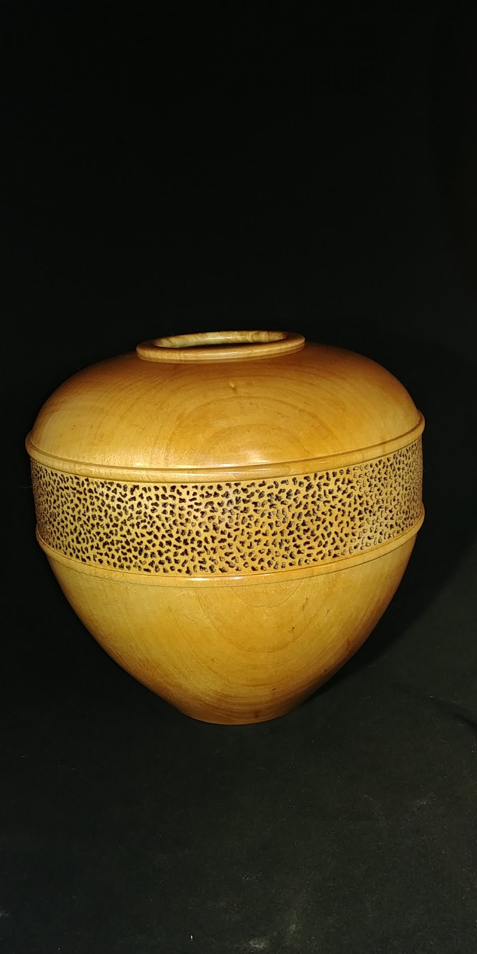 Pierced maple hollow form