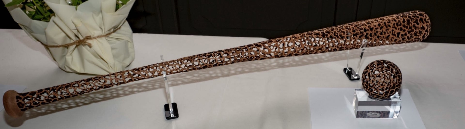 Piercing baseball bat and ball